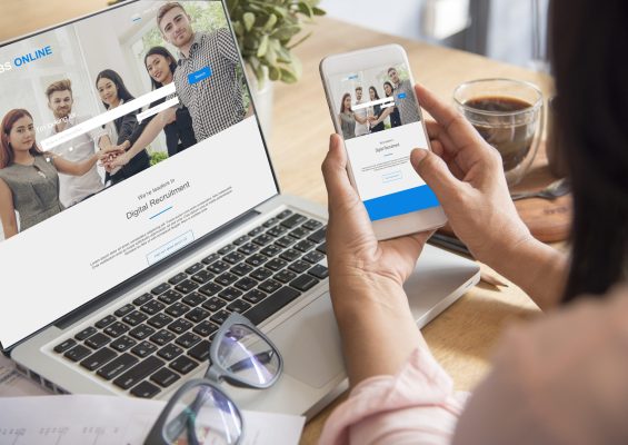 Happiness Asian Woman working from home using laptop online meeting in home office