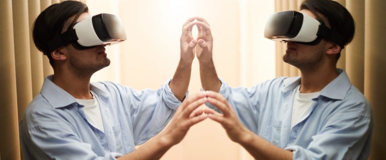 Young man with vr goggle touching mirror and his reflection during virtual experience in another reality
